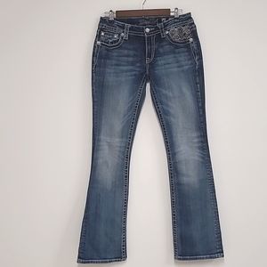 Miss Me signature boot cut size 30 distressed in excellent condition. Inseam 34"